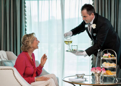 Butler serving afternoon tea